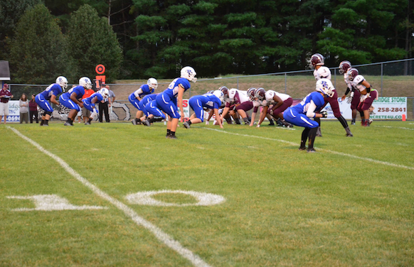 The Cats prepare on defense against Amherst County High School on September 16. Photo by Eric Young