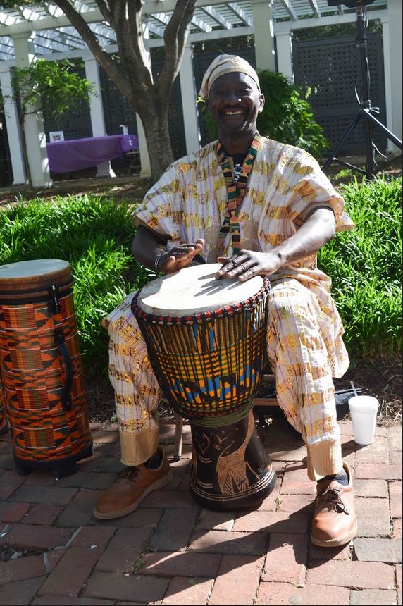 Lamine Sylla plays a traditional African drum at Rockbridge Interfaith festival.


