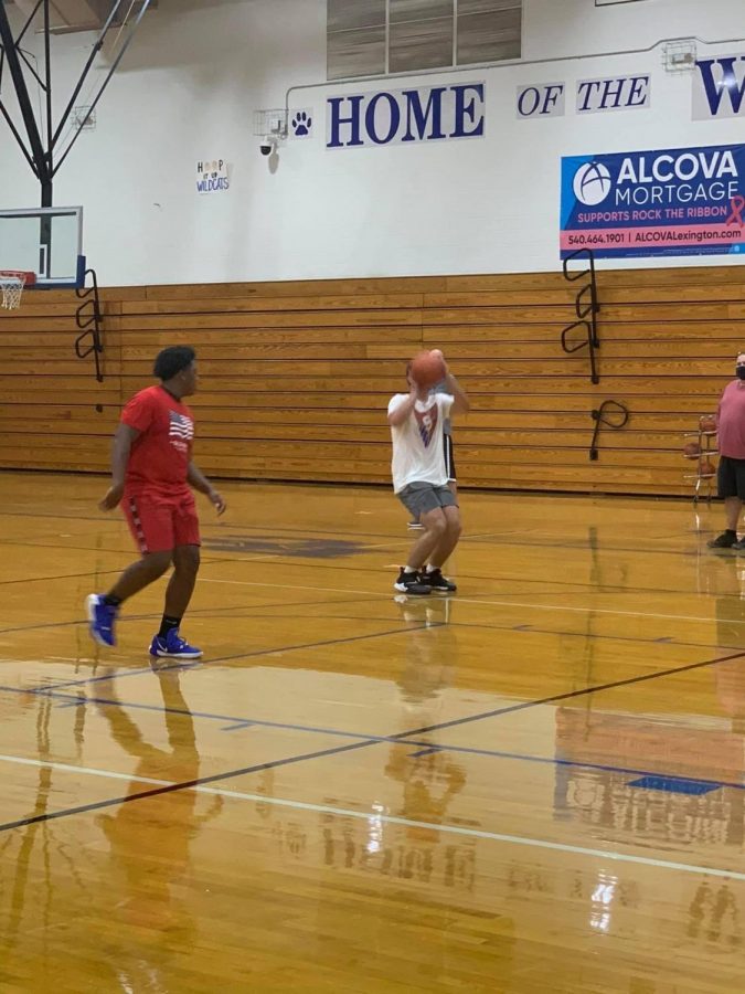 Junior Austin Higgins shooting during a practice