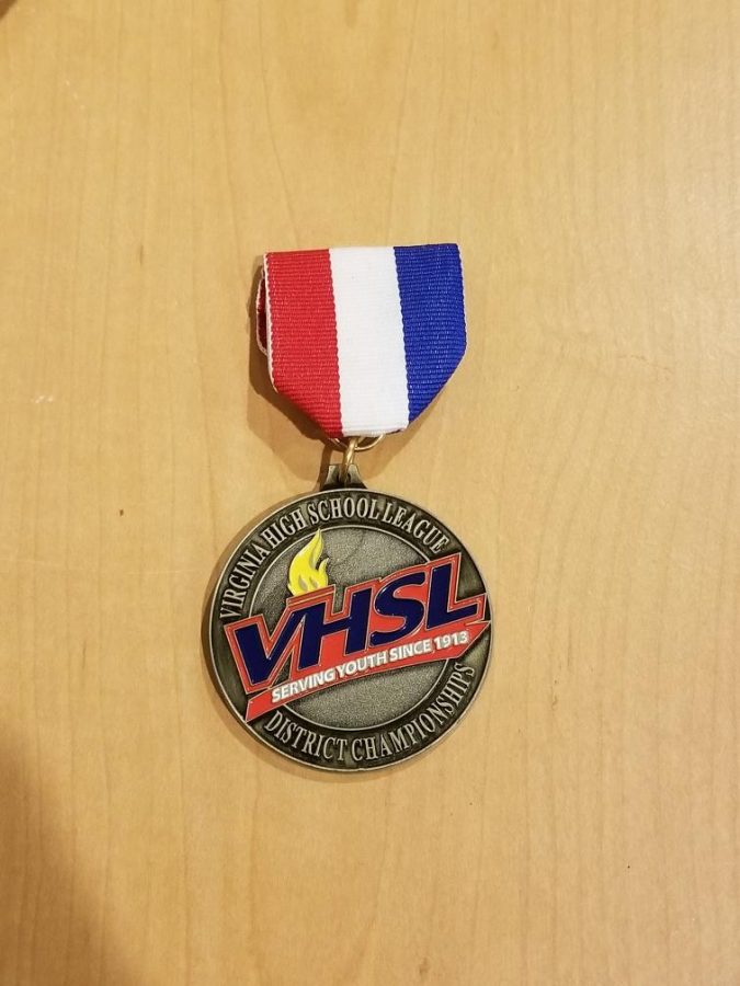 A medal Miles won from Academic Team