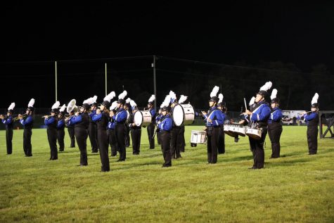 Marching Wildcats perform at a halftime show. 