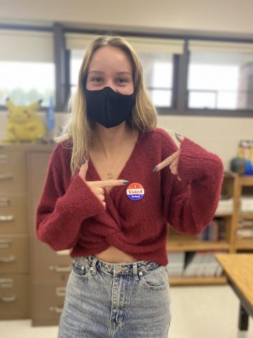 Student Luci Hanstedt proudly sports her ‘I Voted’ sticker after voting in the VA local and state election earlier that morning.