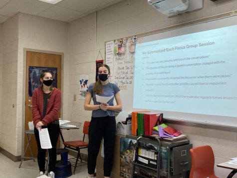 Students Emily McClung and G Mckeeman practice presenting their end of semester presentation for their independent study on food insecurity at RCHS. 