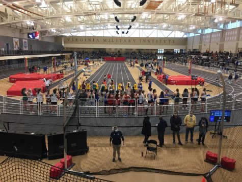 A sprint race preparing to start at the Keydets Indoor Track and Field Invitational Meet at Virginia Military Institute in the Corps Physical Training Facility. 

