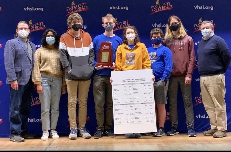The+RCHS+Academic+team+holding+their+scoreboard+from+the+VHSL+state+championship.+%28From+left+to+right%3A+Mr.+McGrath%2C+Saara+Basuchoudary%2C+Ryan+Squire%2C+Miles+Zoellner%2C+Arden+Courtney-Collins%2C+Nicholas+Faulds%2C+Jesse+Humston%2C+and+Dr.+Bradley.%29+%0APC%3A+Rockbridge+Athletics+%0A