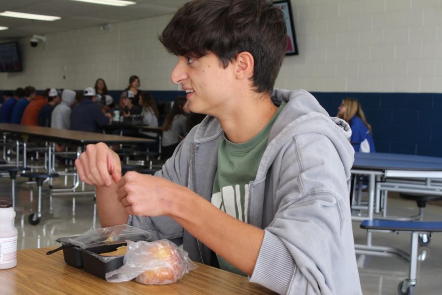Spanish exchange student Jorge Martinez enjoys lunch.