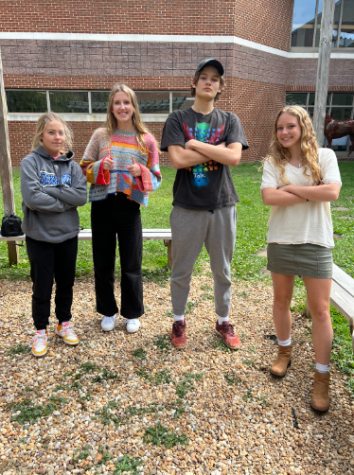 Students hanging out in the courtyard show off their fits of the day. 