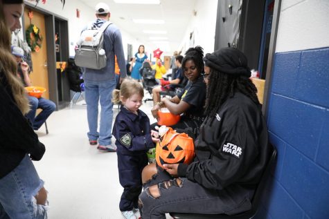 Families enjoy the Halloween Fair. Photo credit: McKenzie Poulsen