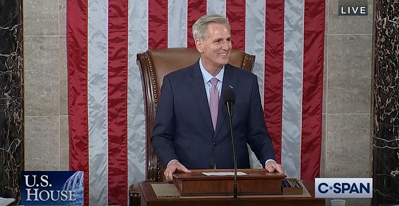 Kevin McCarthy listening just after becoming Speaker of the House by C-SPAN, from Wikimedia Commons, License. 
