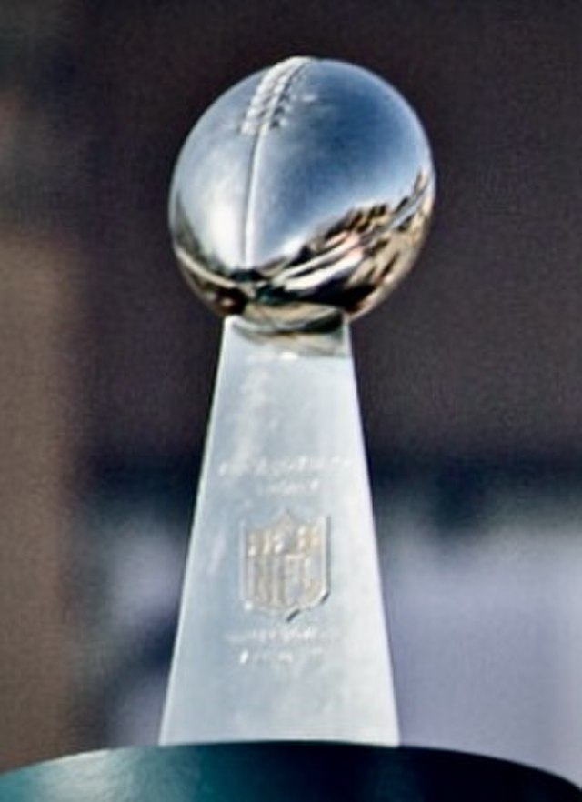 The trophy of the Super Bowl champion, Lombardi Trophy by Tom Wolf, from Wikimedia Commons, 
License. 