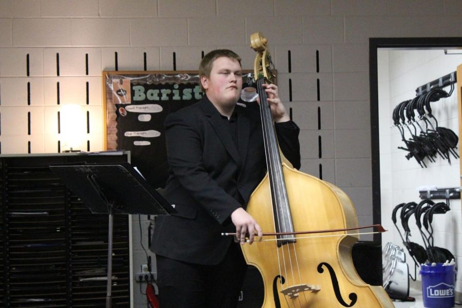 Photo by McKenzie Alley of Jake Cline practicing String Bass