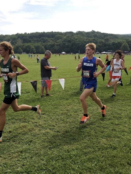 Freshman Tyler Ludke runs to keep up a strong pace at the Knights Crossing Invitational. 

Photo courtesy of Deena Ludke. 

