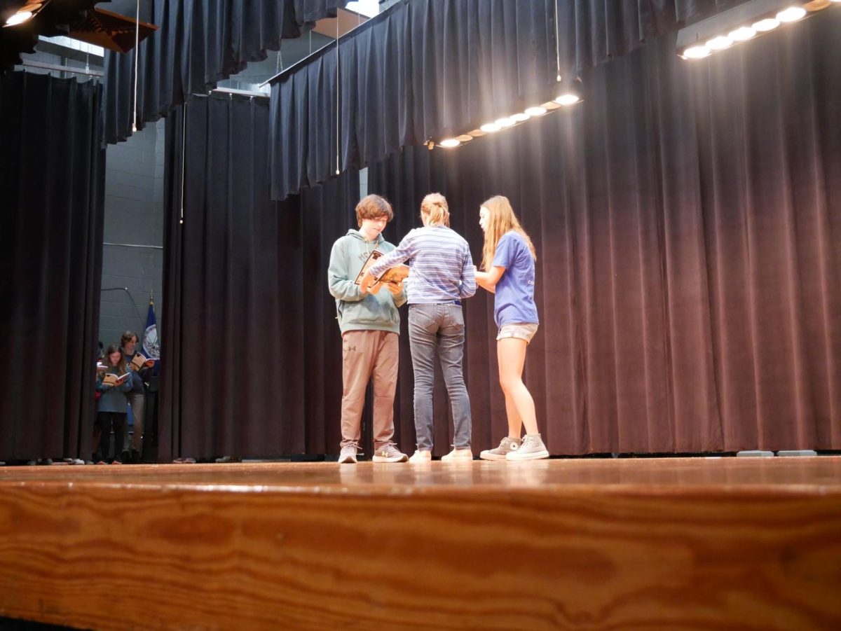 (left to right) Jackson Johnson, Keely Newman, and Lena Greer 
rehearsing a scene
