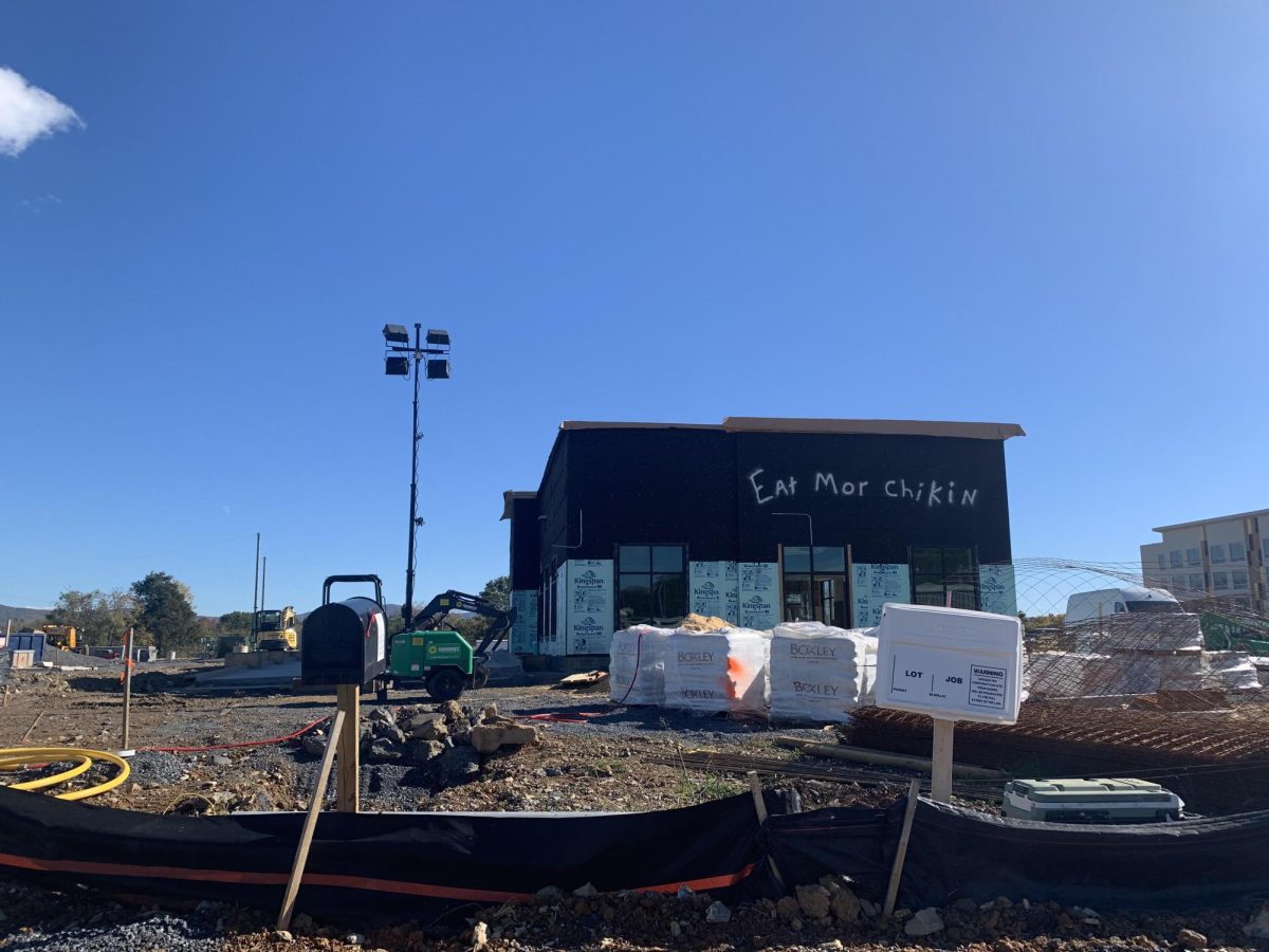The construction of Chick-Fil-a adjacent to the highway and next to Dunkin Donuts. 
