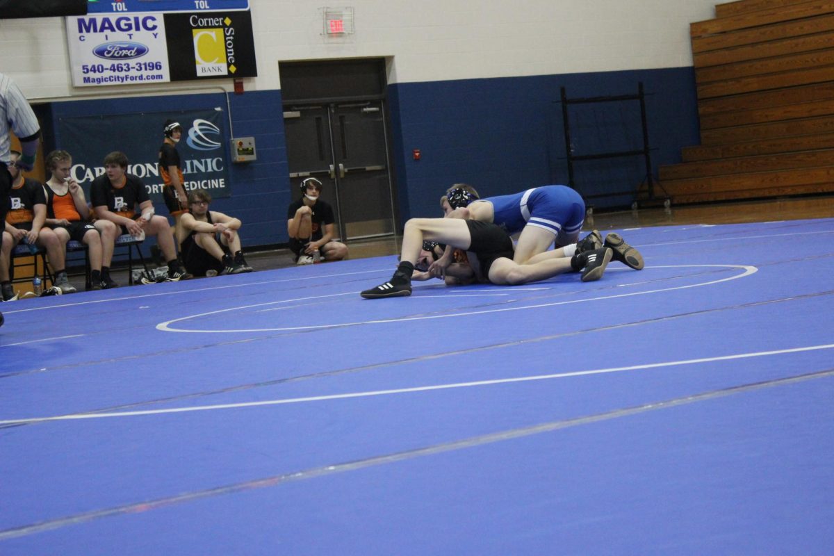 Hudson Ryan pins a wrestler from Bath County 