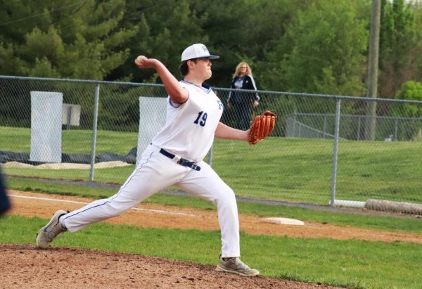 Senior Zac Majors throws a pitch against the Cougars. Photo courtesy of Stephanie Mikels Blevins. 
