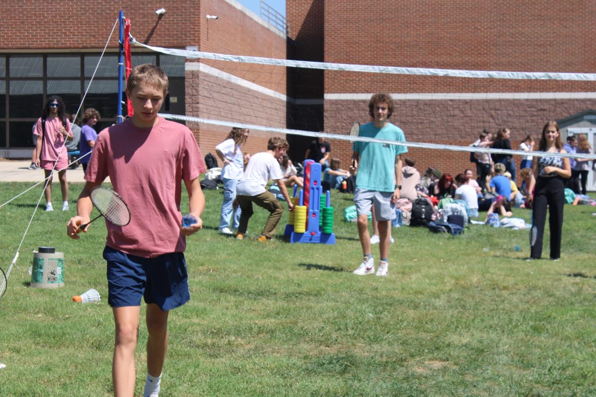 Student plays badminton.