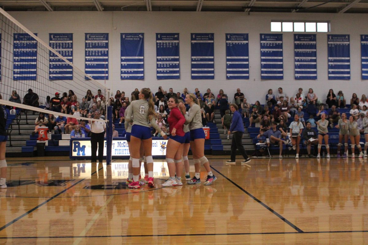 Senior Rebekah Allen celebrates with her team. 