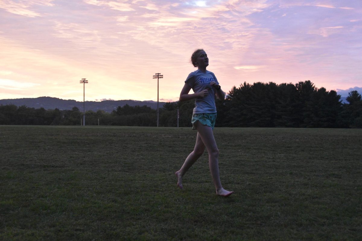 Sophomore Gemma Batis finishes the final lap.