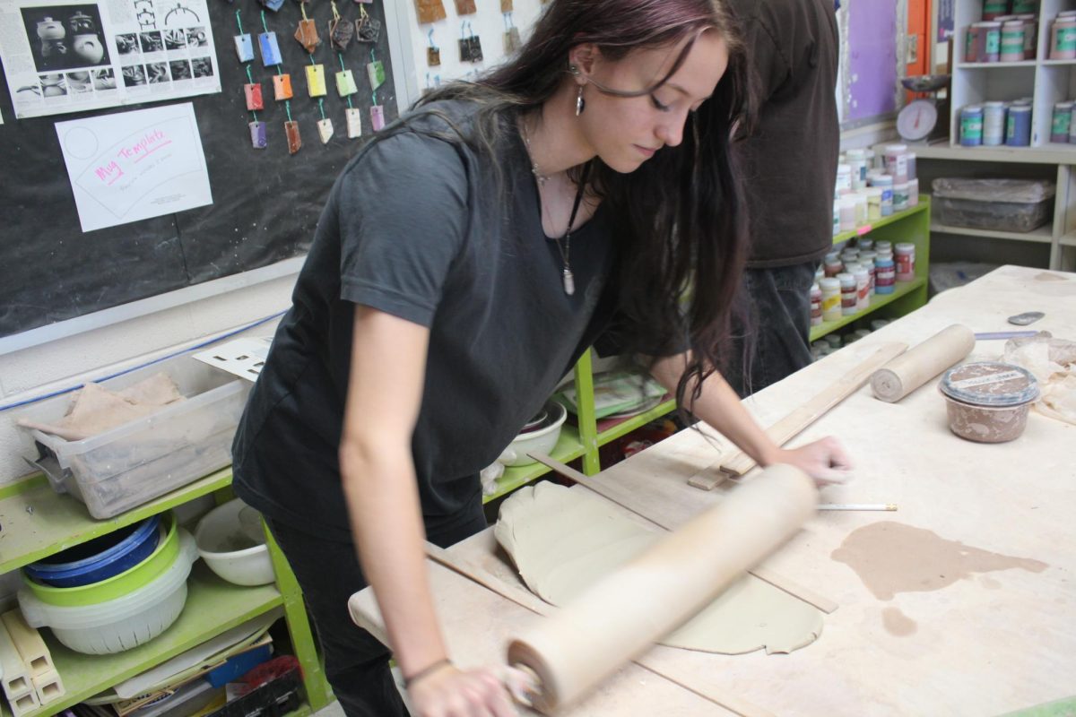 "I am rolling out the clay to cut and make a  tea cup," said senior Magdalena Greer 