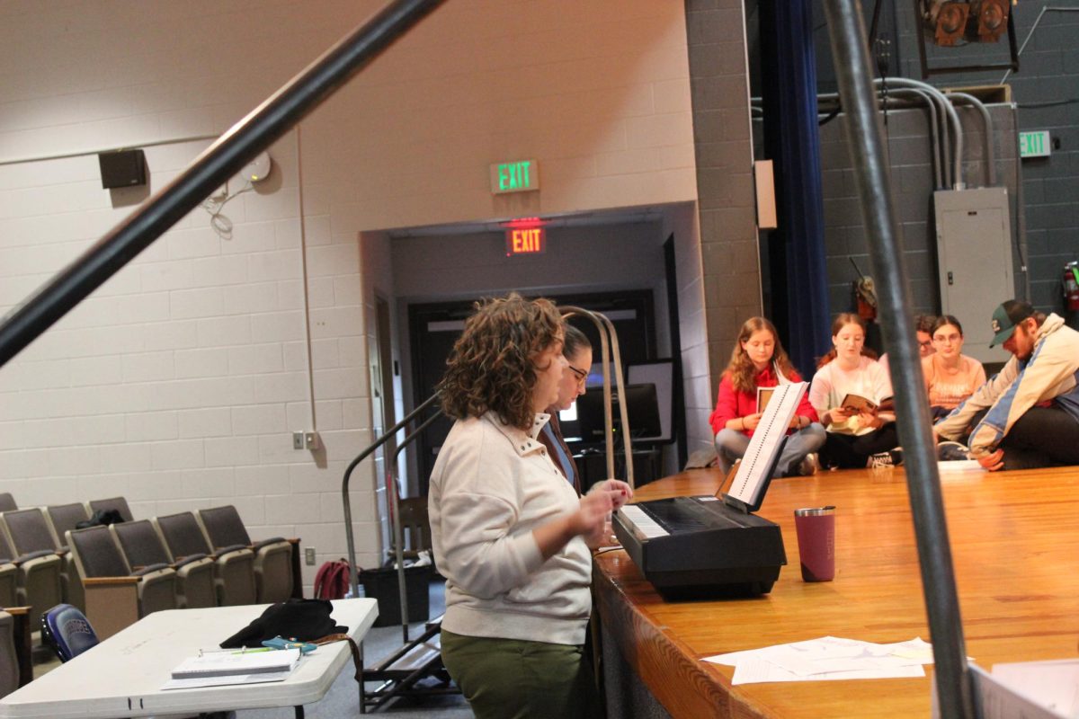 Mrs. Fitz and Mrs. Allen (right to left) give announcements at the beginning of class.  