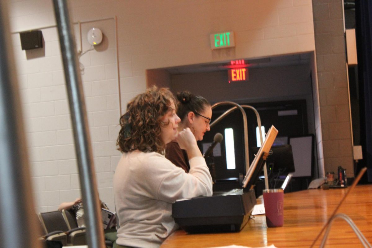 Theater teachers (right to left) Mrs. Fitz and Mrs. Allen give critiques to actors.  