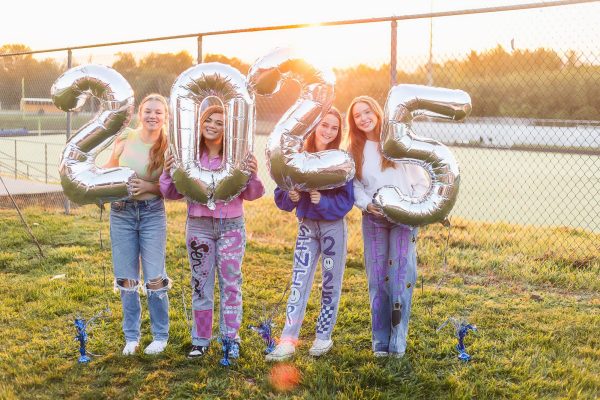 Emall Hall is wearing her senior jeans at the senior sunrise with friends, Parker Dameron, Emily Humphreys, and Faith Mohr.
