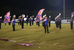 Color guard performing at a football game