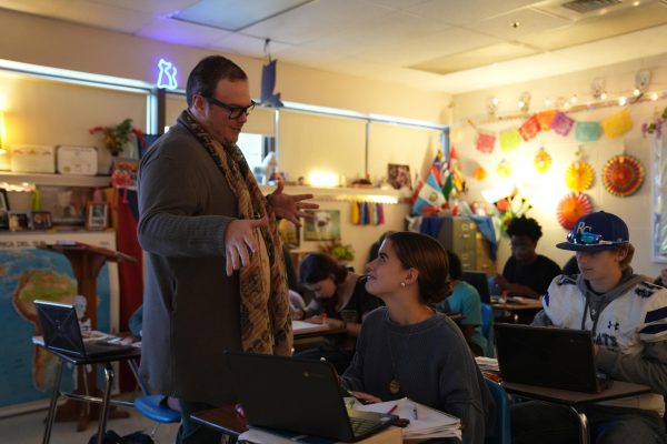 Spanish III teacher, Andy Martin, and Junior Cora Conway talking during second period Spanish class. 