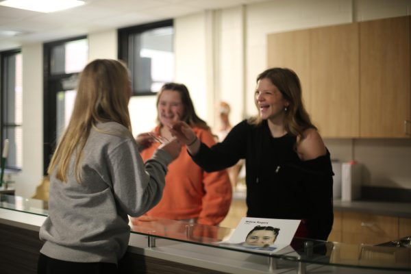 (From right to left) nurse aide students junior McKenzie McCormick, junior Willow Rogers, and another nurse aide student interact in their new classroom. 