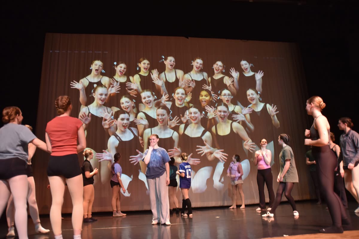 Senior Company members of The Rockbridge Ballet prepare for stage warmup.