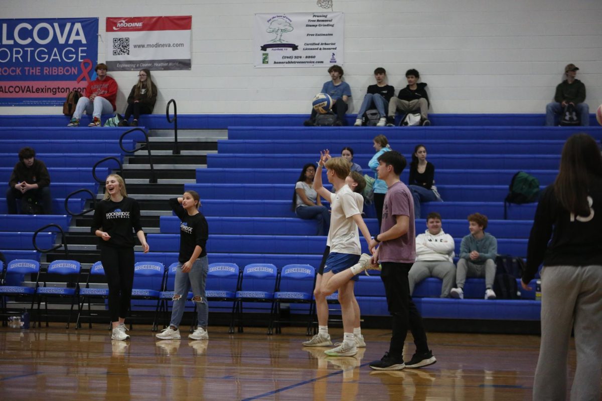 Sophmore players warm up.