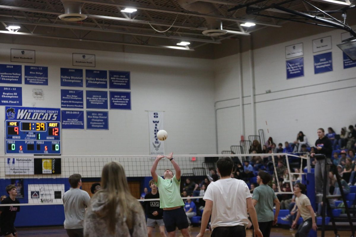 Senior Gardner Clement sets the ball.