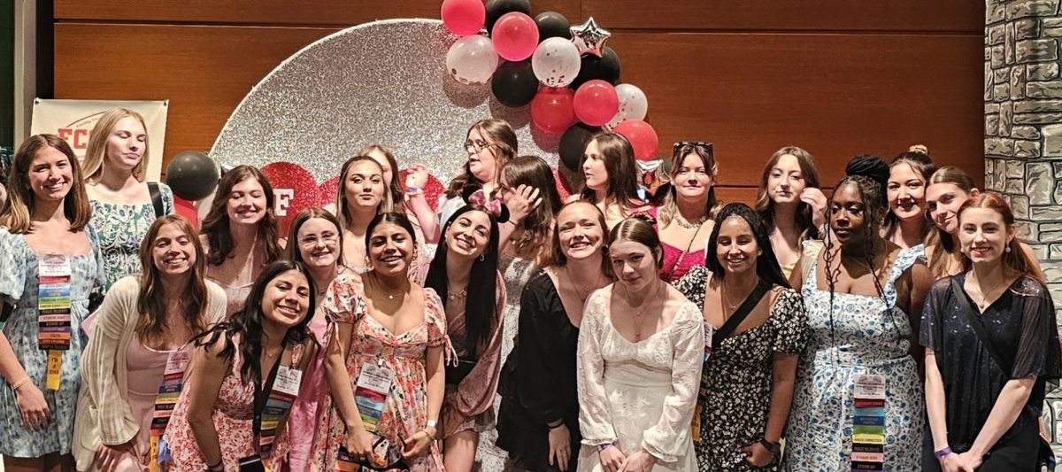 FCCLA takes a group photo the night of their awards banquet dinner  