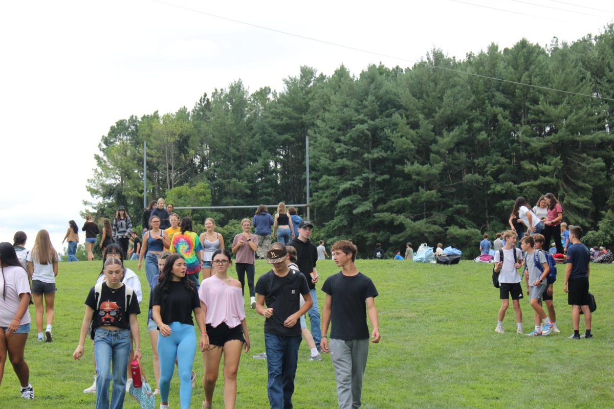 Students enjoy the outdoors during extended lunch.