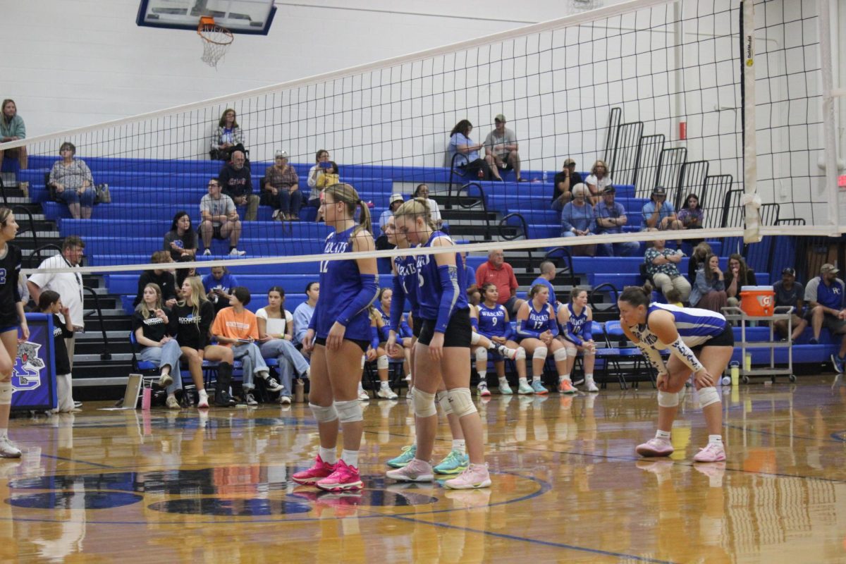 Players prepare for serve.