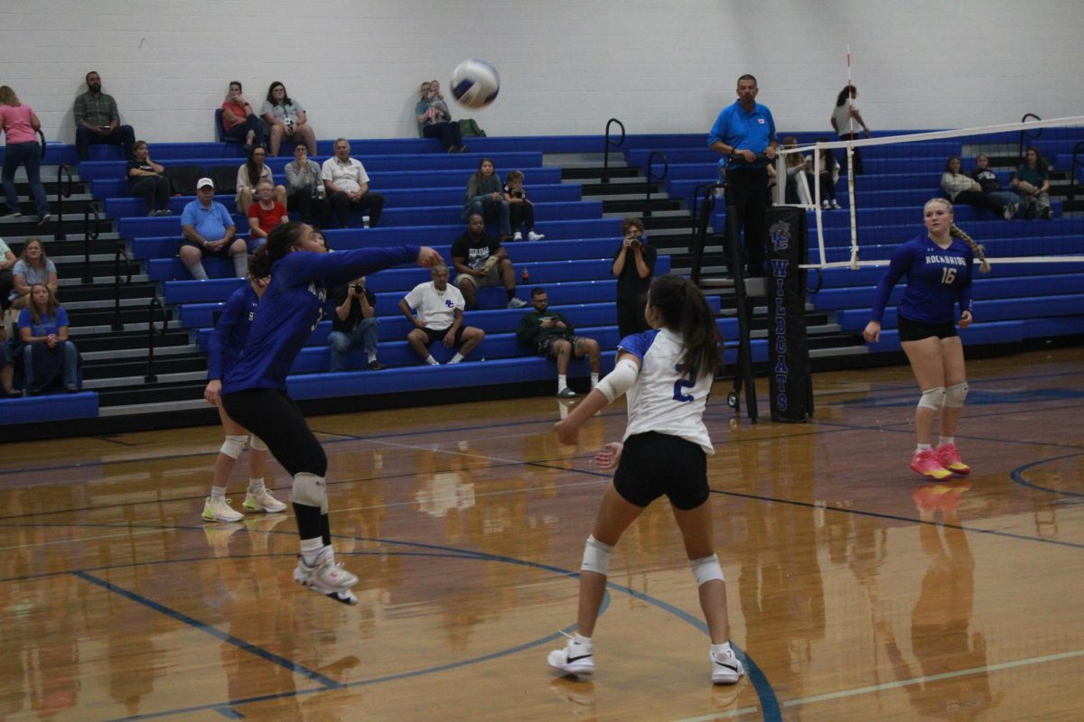 Keziah Howard receives a serve. 