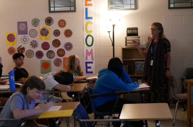 Mrs.Szarzynski teaches her third period English 9 class