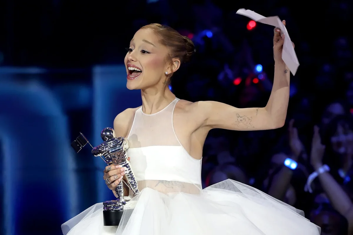 Ariana Grande receives Moon Man.