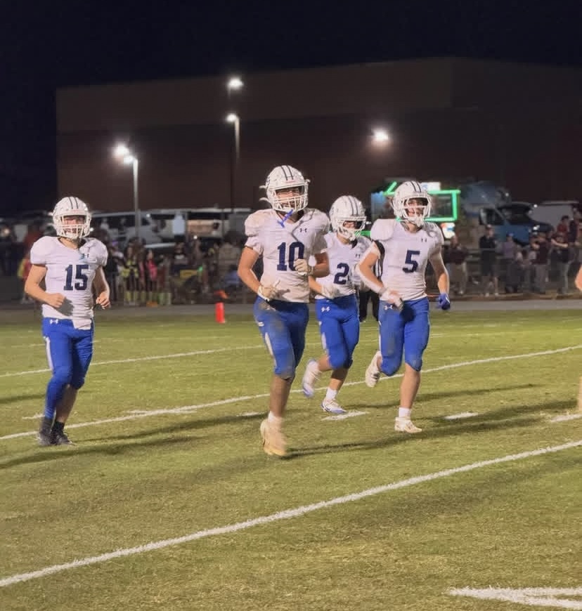 Team members running off the field. Photo courtesy of Rockbridge Athletics.