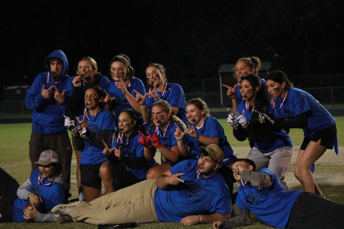 Seniors pose with their medals.