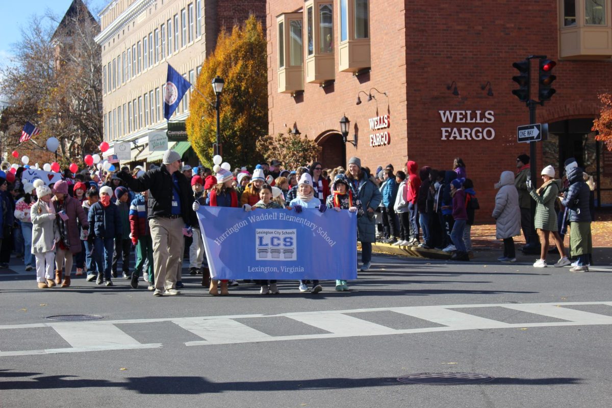 Waddell students walk in parade.
