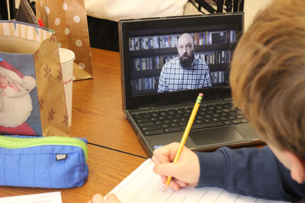 RCHS student takes notes on Heimlers History Video.