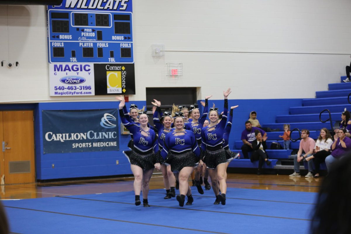 Wildcats cheer getting hyped up before performing