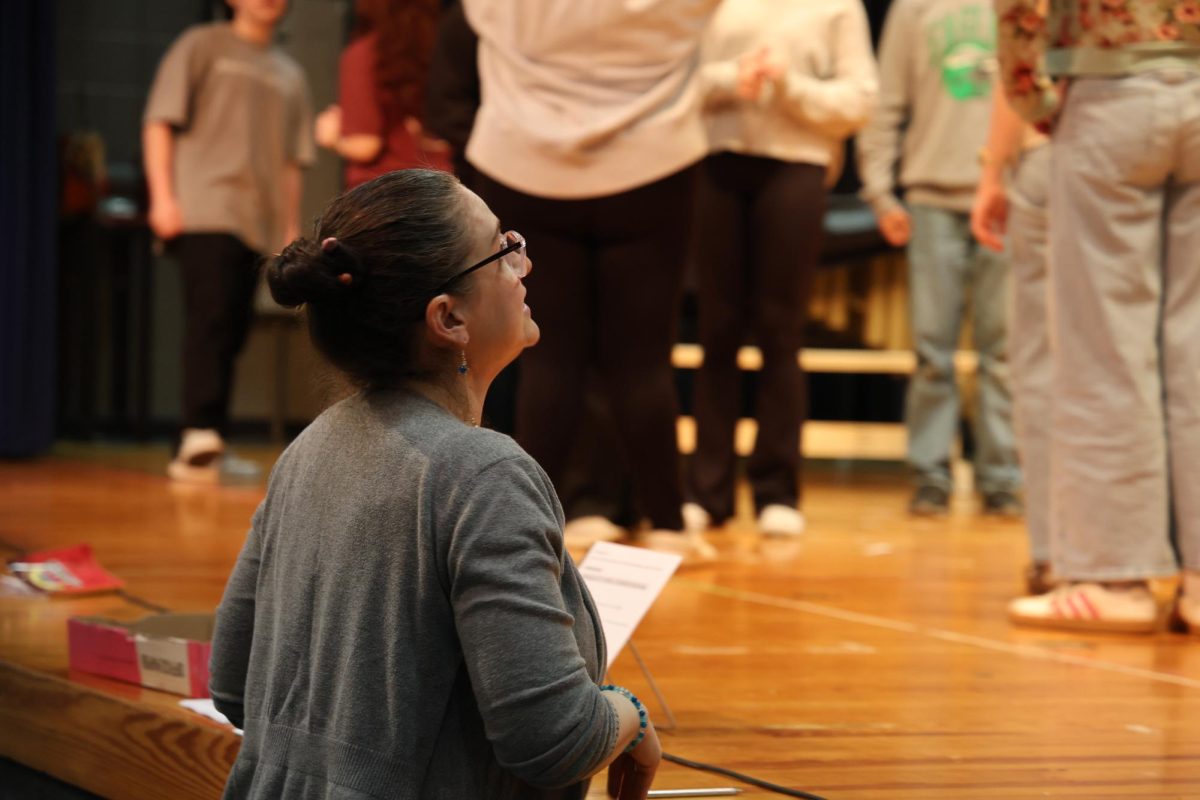 Erin Allen instructing her theater class.