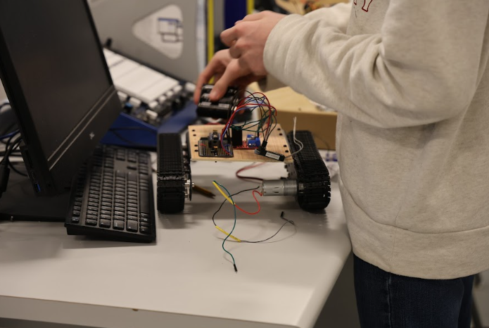 Junior Jack Davis works on his robot during class.
