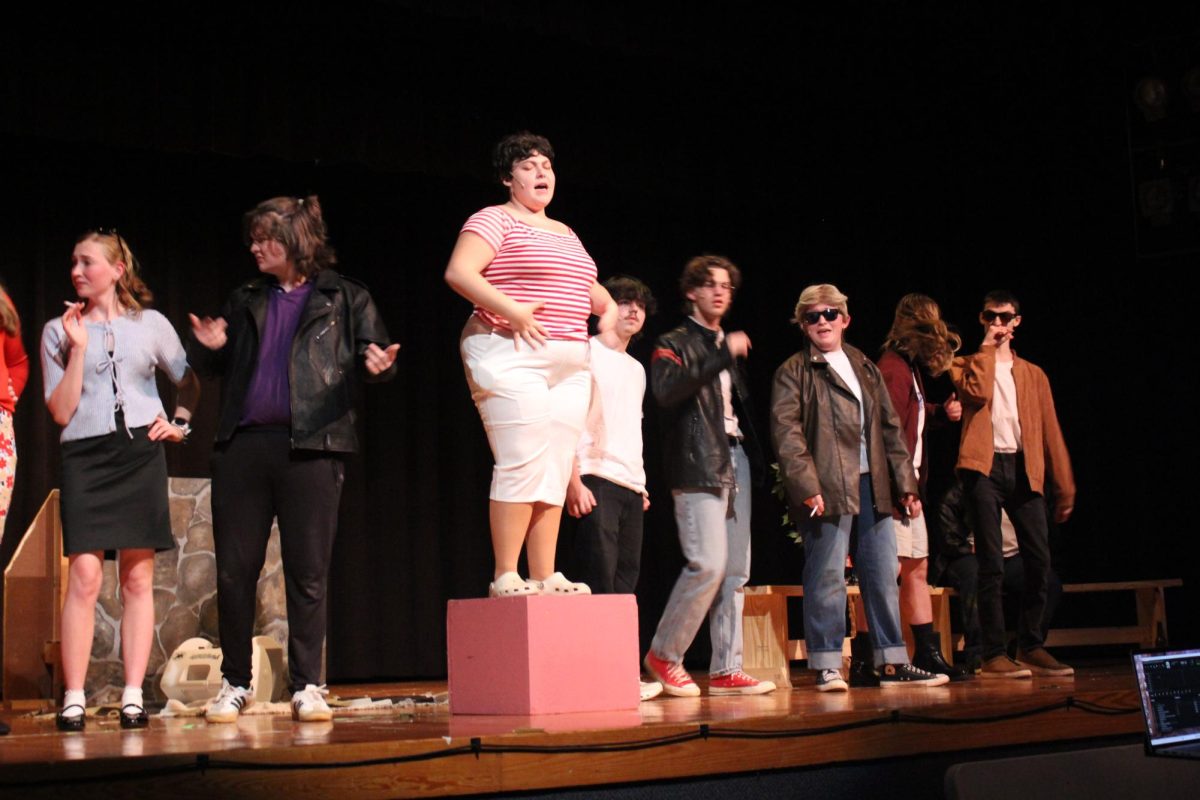 Rizzo (Sierra Hostetter) preforms her song. 