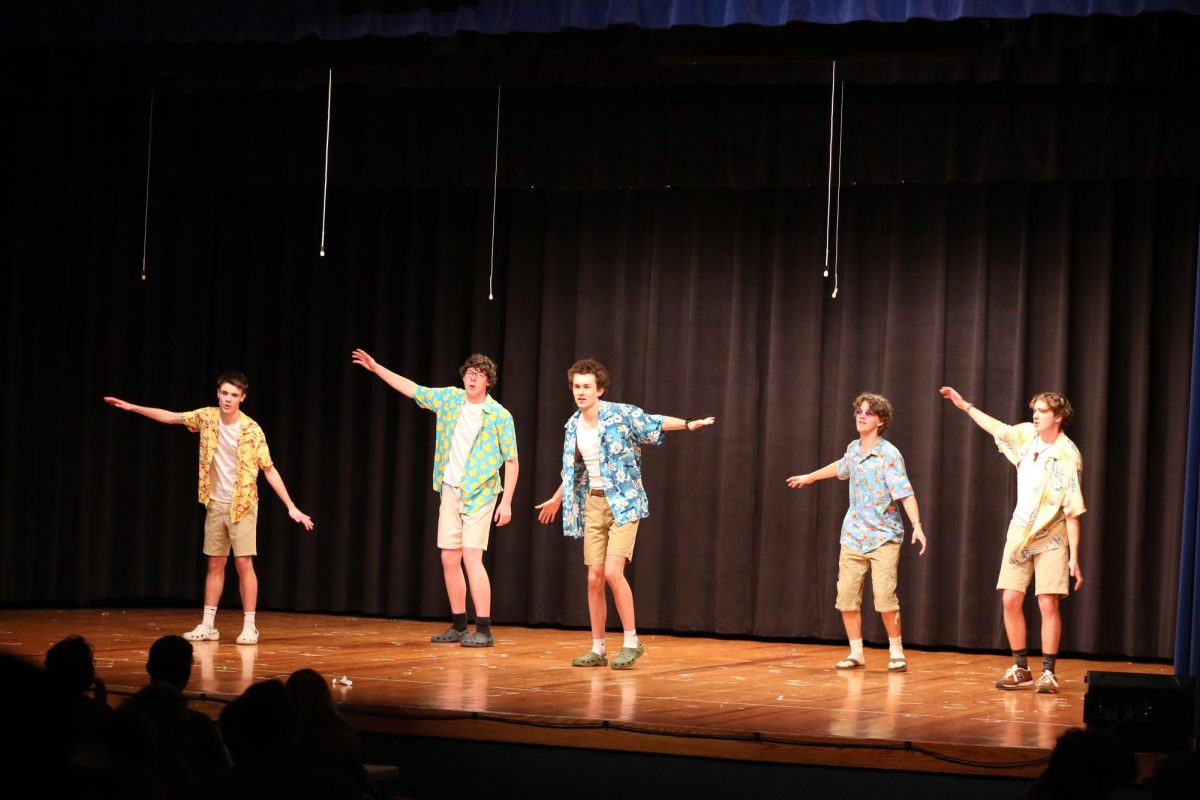 Senior boys group Noah Alexander, Thomas Jones, Ethan Erskine, Henry Hirt, and Fisher Howald dance and sing to a Beach Boys mashup