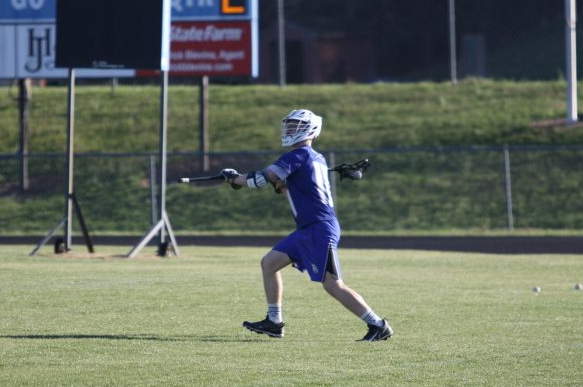 Gus Daigneau prepares to clear the ball. 