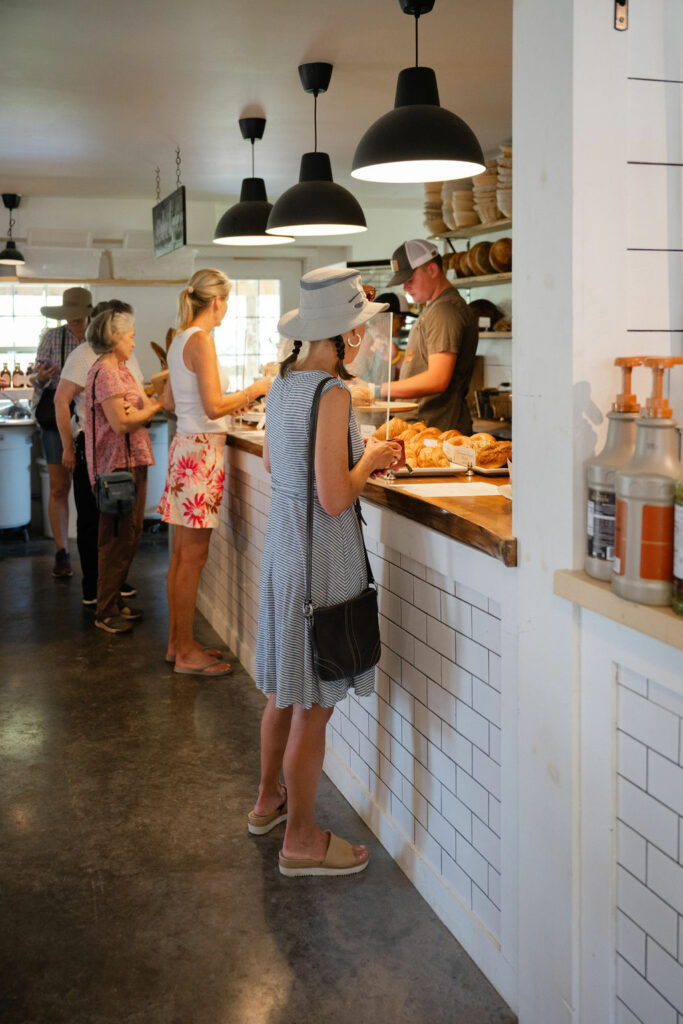 Customer ordering inside the Bread Barn at Bread Day.
